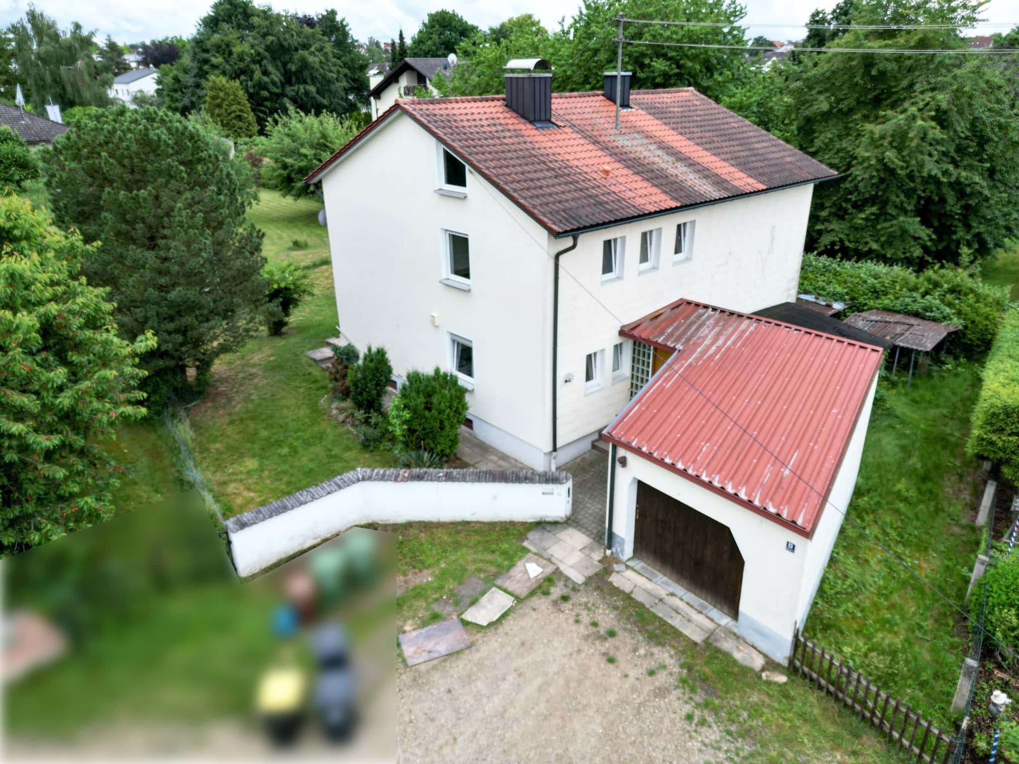 Einfamilienhaus mit traumhaftem Garten und Entwicklungspotenzial